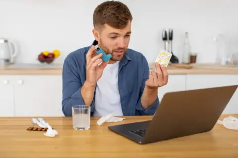 busy man taking meds