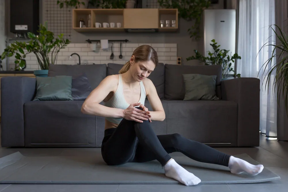 woman with muscle cramps